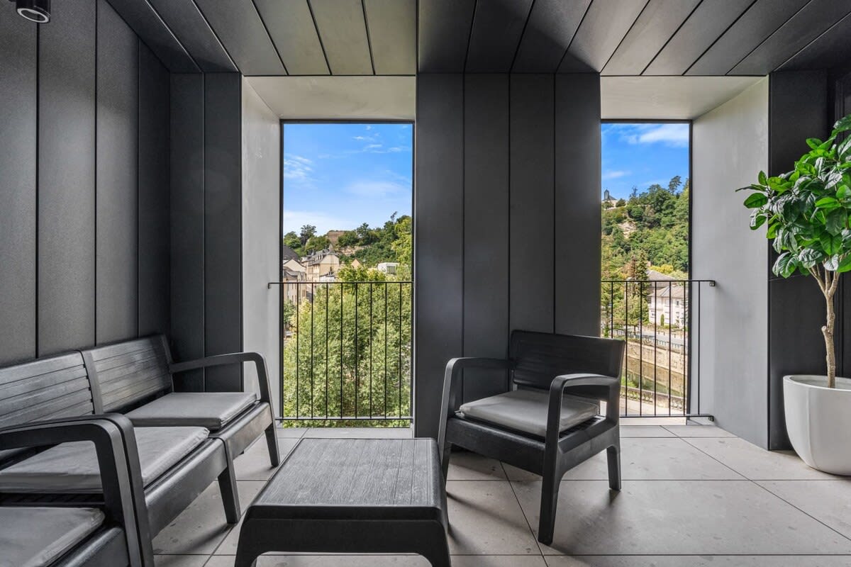 Bask in the tranquility of our private balcony with picturesque views.