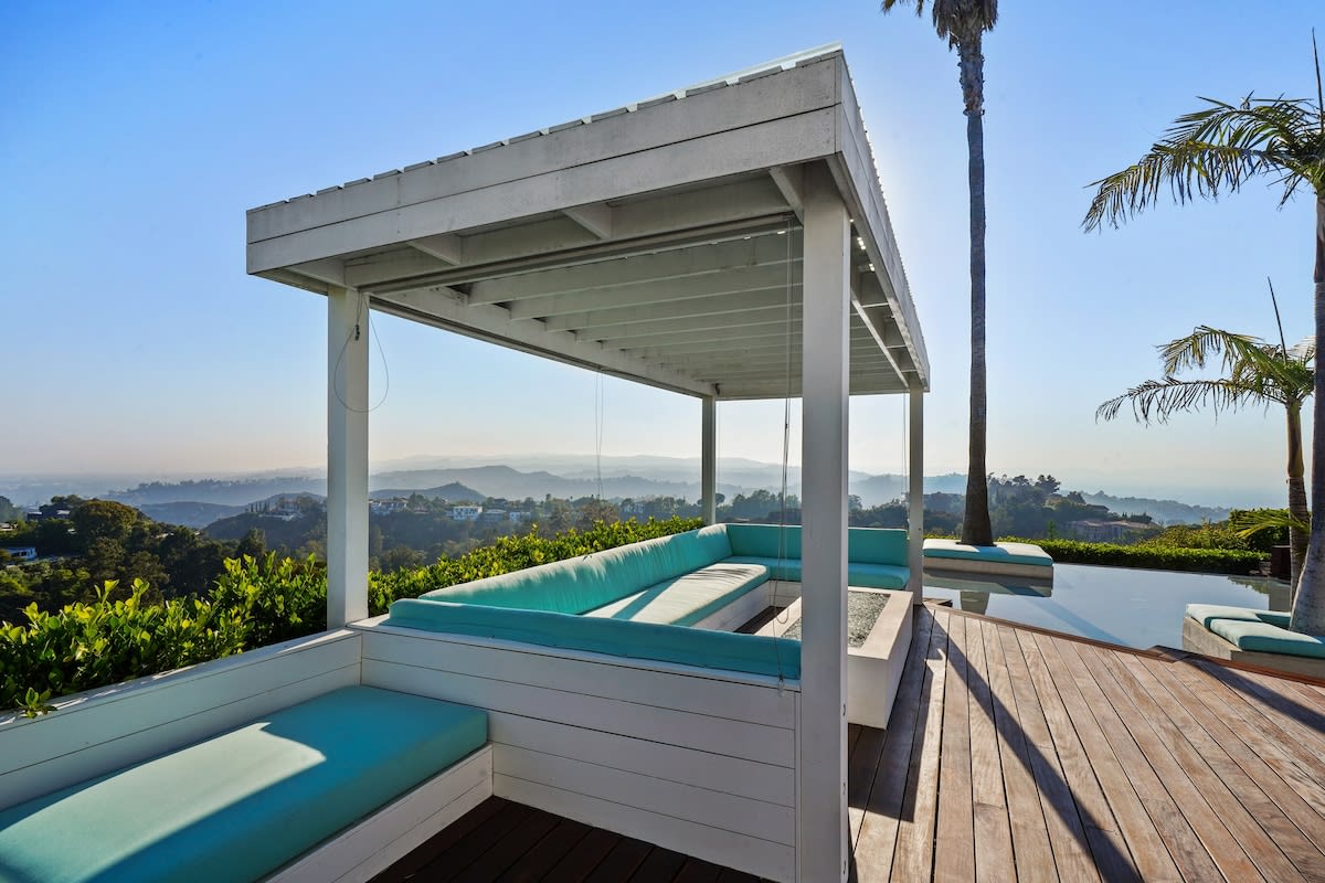 Shade and serenity await in the plush cabana seating. Relax and unwind in absolute comfort.
