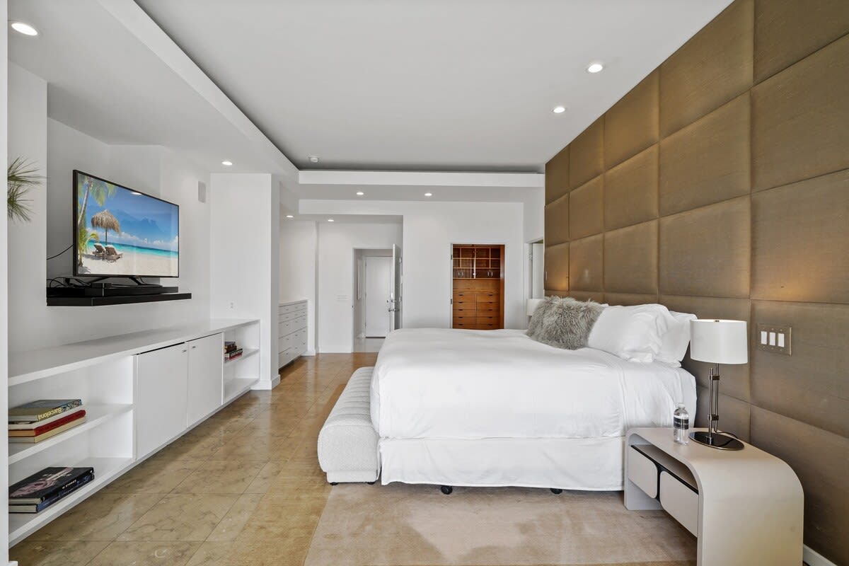 Two bathrooms are available in the primary bedroom, ensuring convenience and privacy.