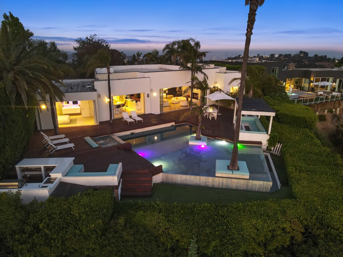 Embrace the Beauty of the Setting Sun from the Outdoor Deck, as nature's canvas creates an awe-inspiring display of colors.