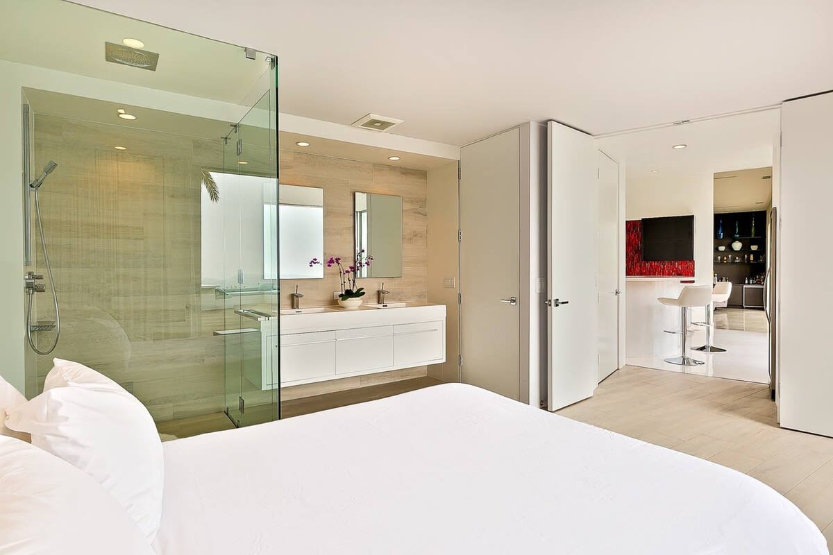 Indulge in the spacious in-room shower, promising a luxurious and refreshing experience.