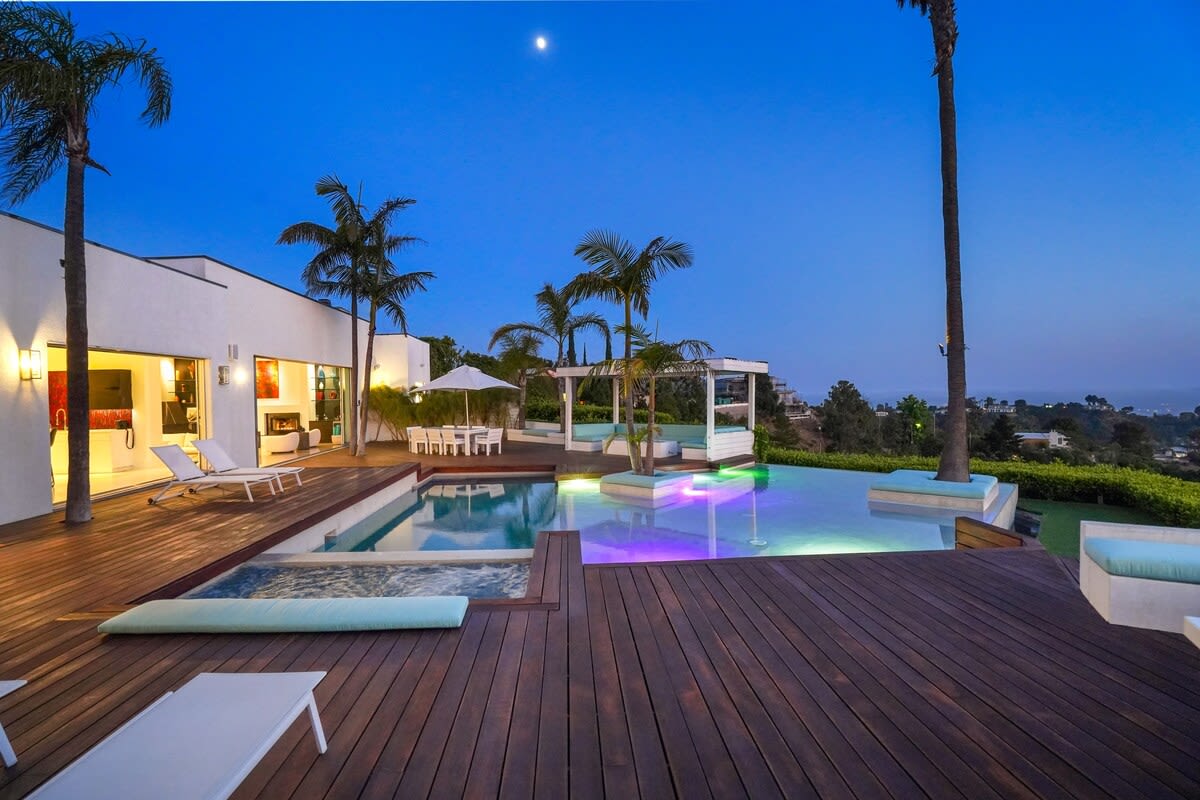 Experience Pool Serenity Under the Night Sky, where the peaceful ambiance invites relaxation and contemplation.
