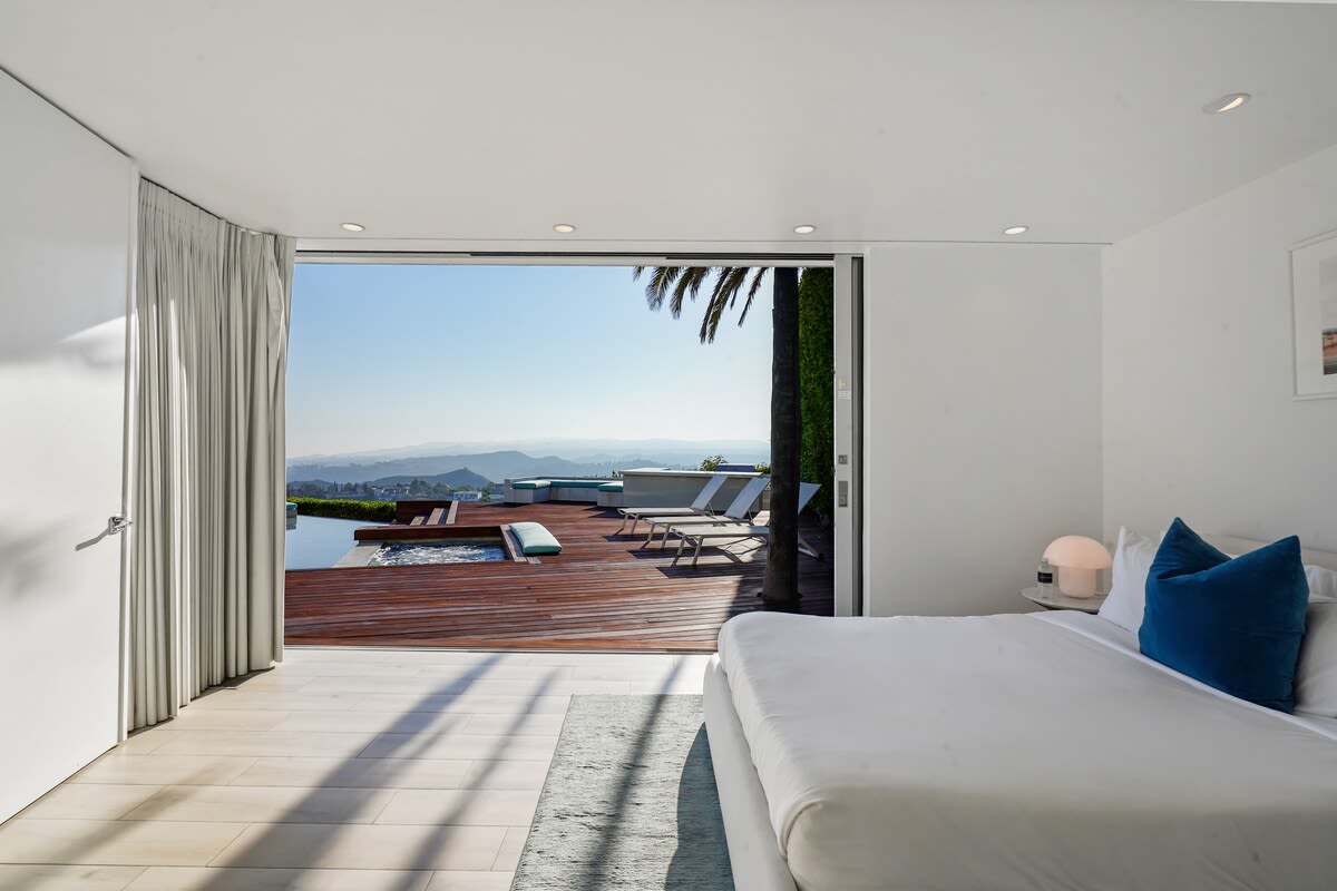 Experience restful sleep with blackout curtains for a serene ambiance.