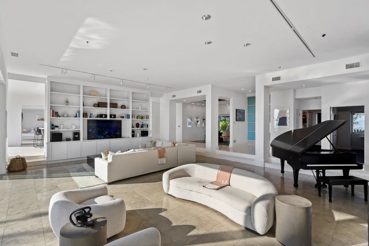 A Grand Piano in the Living Area invites you to indulge in musical moments while surrounded by the luxurious ambiance.