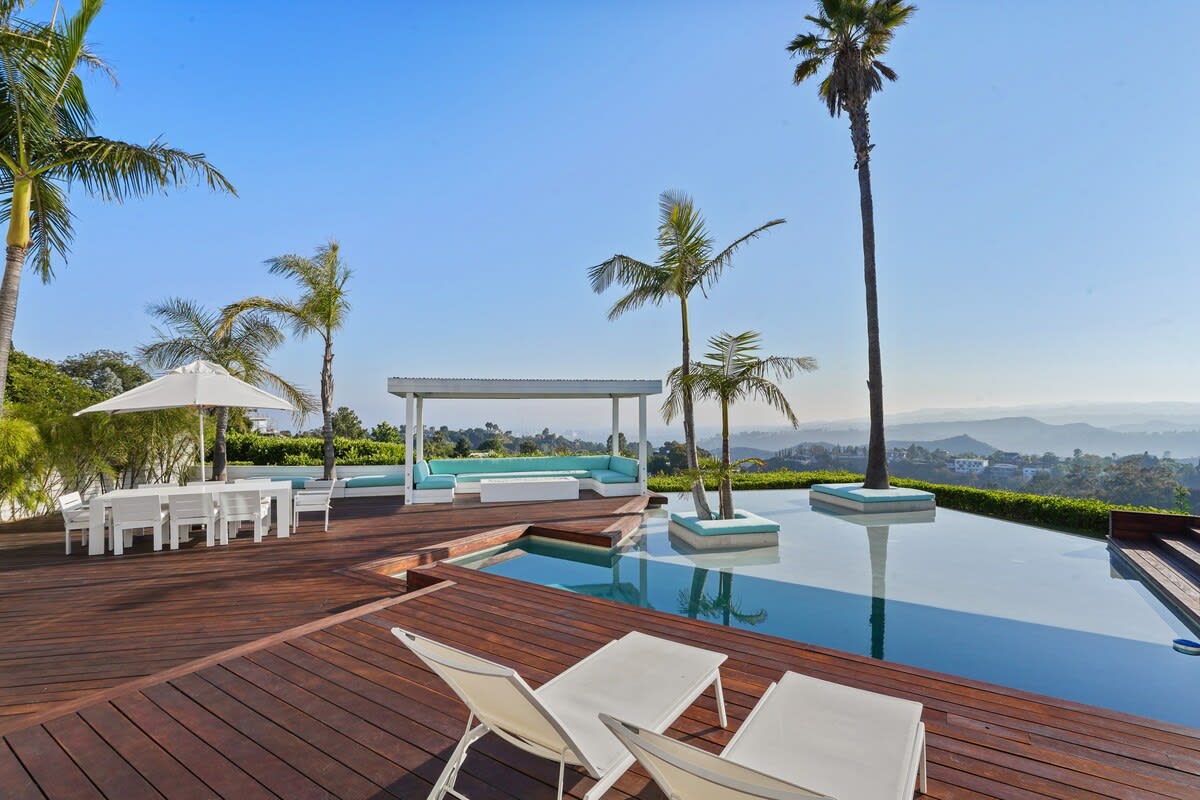 Bask in the glorious daytime sun on the spacious deck, perfect for soaking up the warm rays and enjoying outdoor activities.