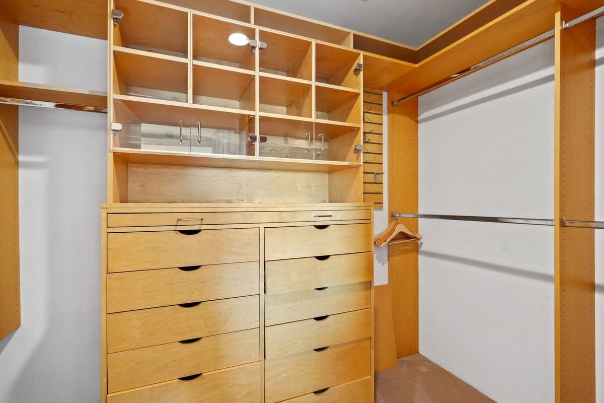The primary bedroom includes a walk-in closet, providing generous space for your wardrobe and belongings.