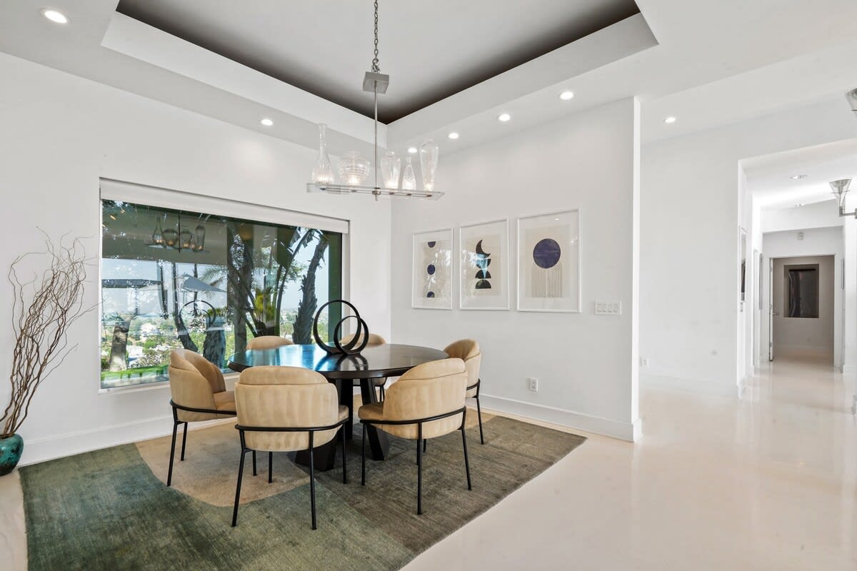 The Dining Room is perfectly designed to seat six people, offering a cozy and stylish space for shared meals and cherished memories.