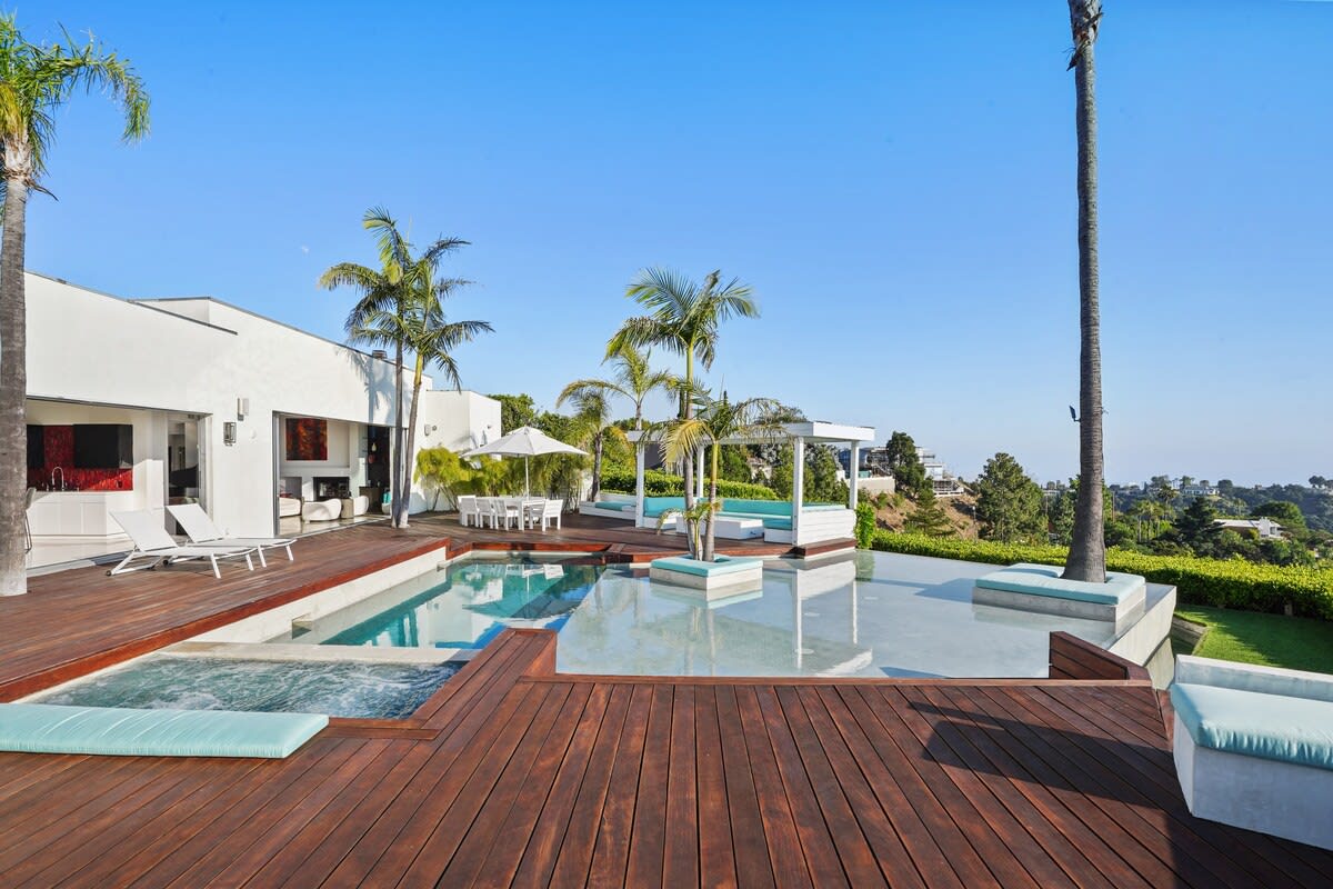 Palm trees and paradise! The outdoor area features majestic palms that lend an exotic touch to your escape.