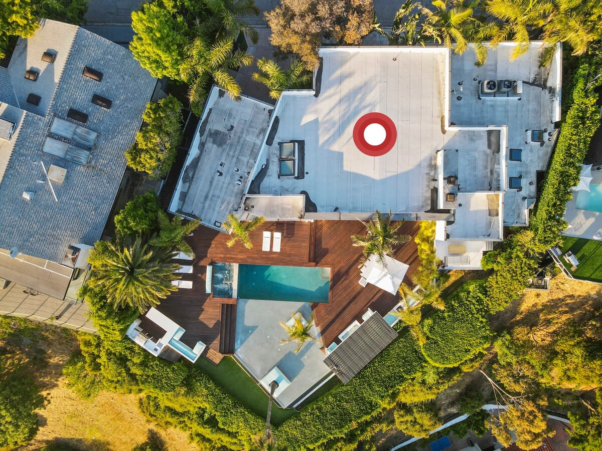 Marvel at the grandeur of the home from an elevated perspective, showcasing its elegance and charm.
