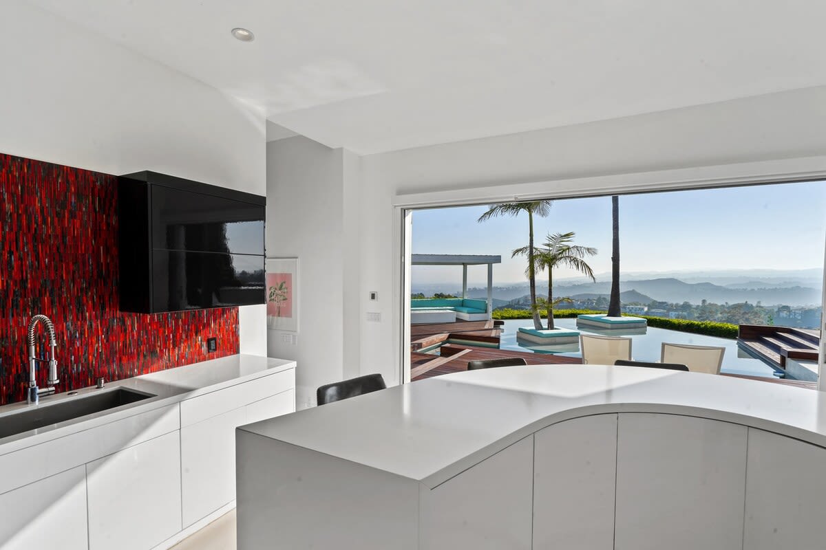Plenty of counter space in the kitchen provides an ideal setup for meal preparation and cooking experiences.