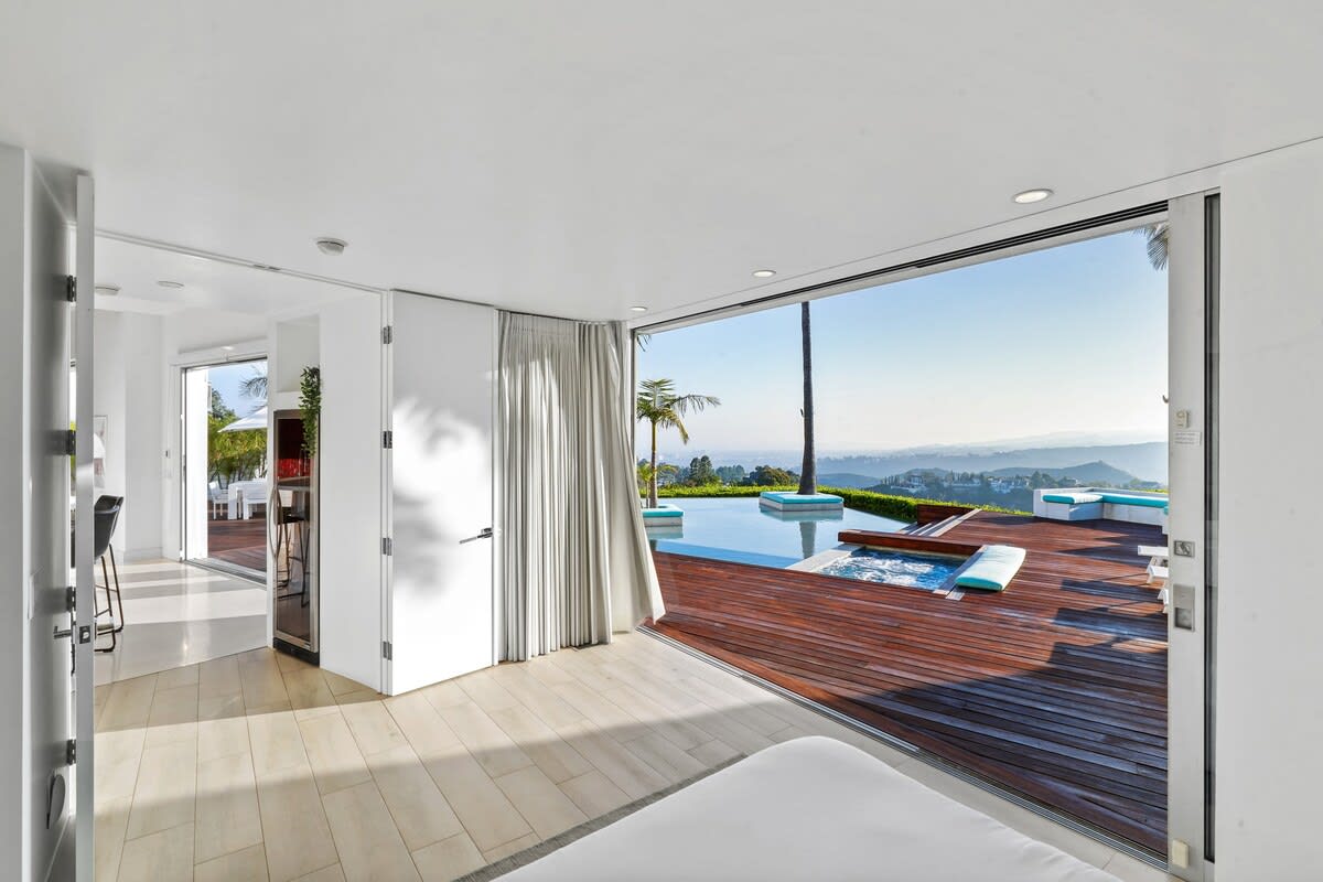 Unwind in the ultimate relaxation with a Jacuzzi just outside the bedroom.