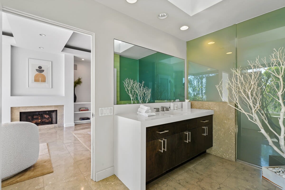 Embrace the warmth and elegance of a fireplace right in the primary bedroom.