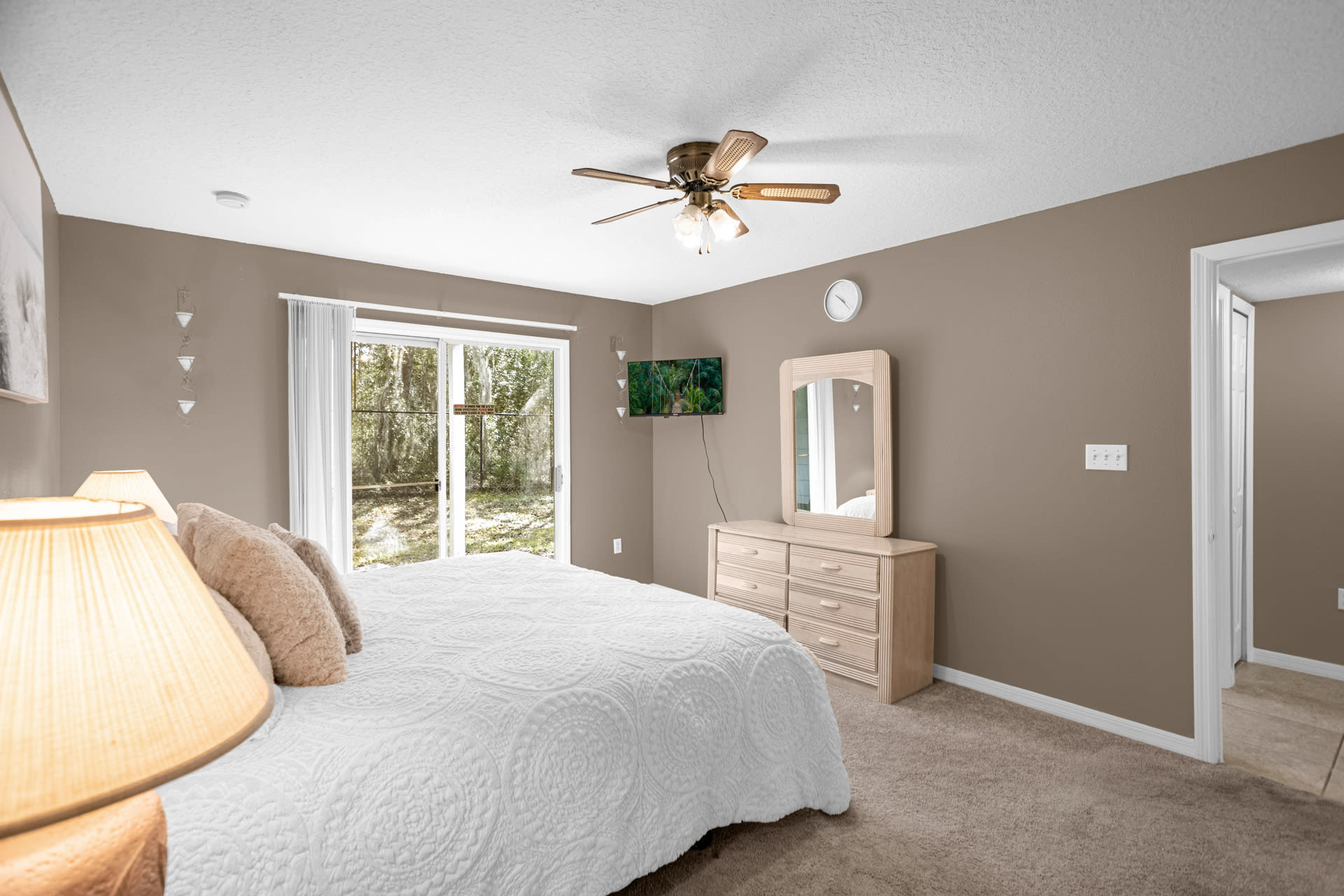 Enjoy Direct Patio Access From This Bright And Airy Bedroom