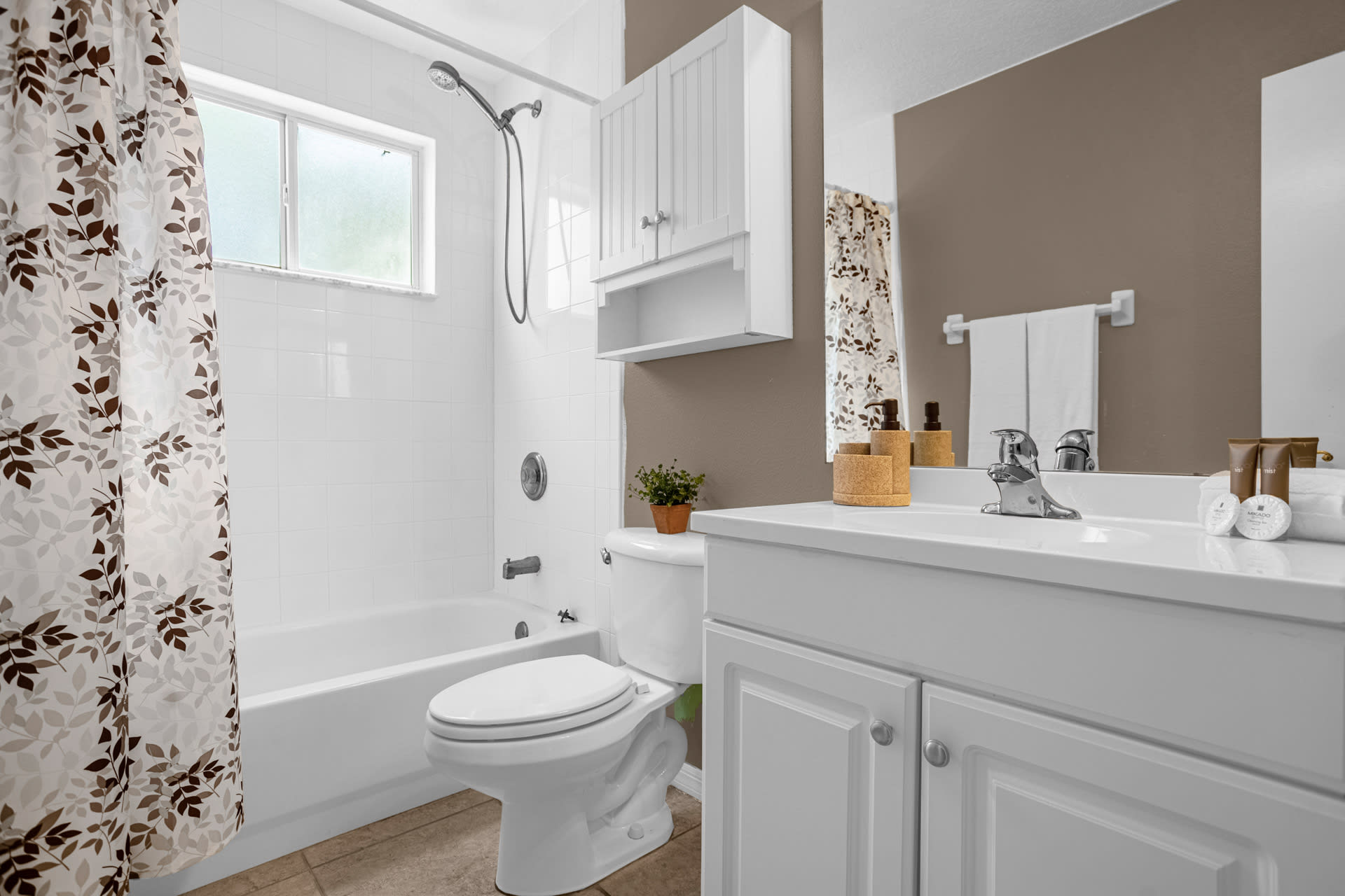 Bright Bathroom With A Relaxing Shower And Elegant Details