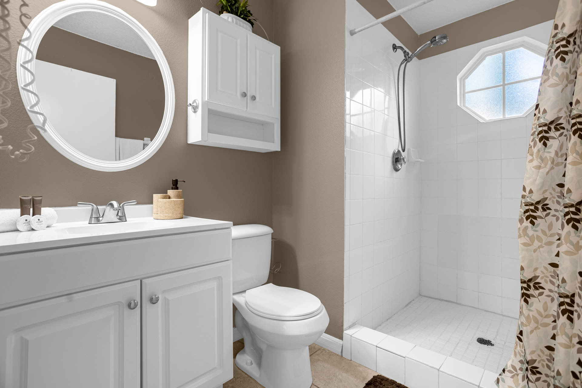 Refresh In This Bright Bathroom With A Spacious Shower And Sleek Design