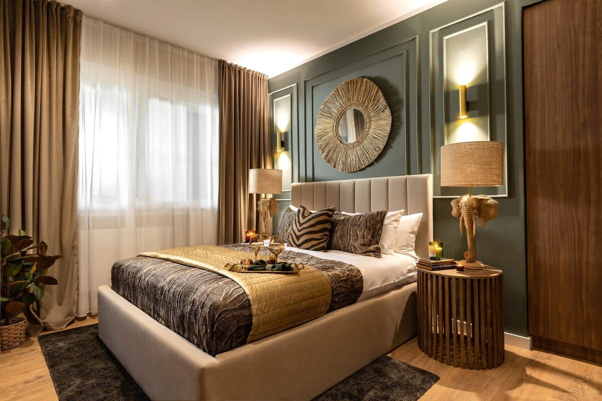 Step into our opulent oasis 🌴, where gold accents ✨ and lush greenery 🌿 create a modern jungle retreat.