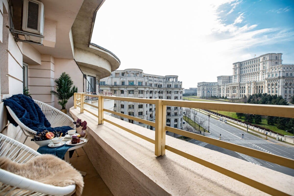 Marvel at the majestic sight of the Palace of the Parliament from our balcony, offering a vista that captivates with its grandeur and allure.