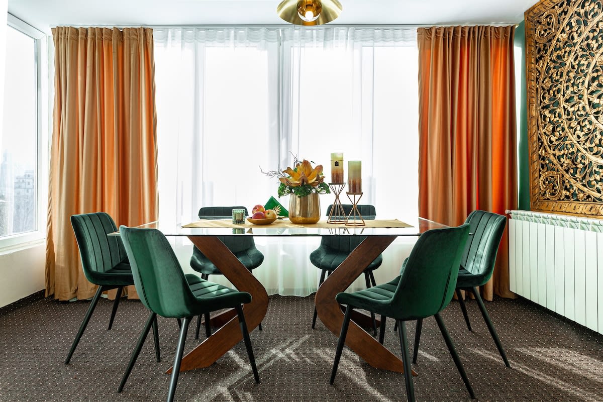 Located on the 8th floor, the dining room is surrounded by natural light, offering an incredible view over Cismigiu Park, House of Parliament and the rest of Bucharest!