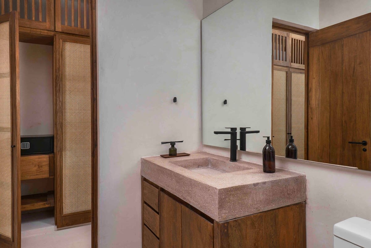 Ensuite bathroom, closet features a safe for valuables
