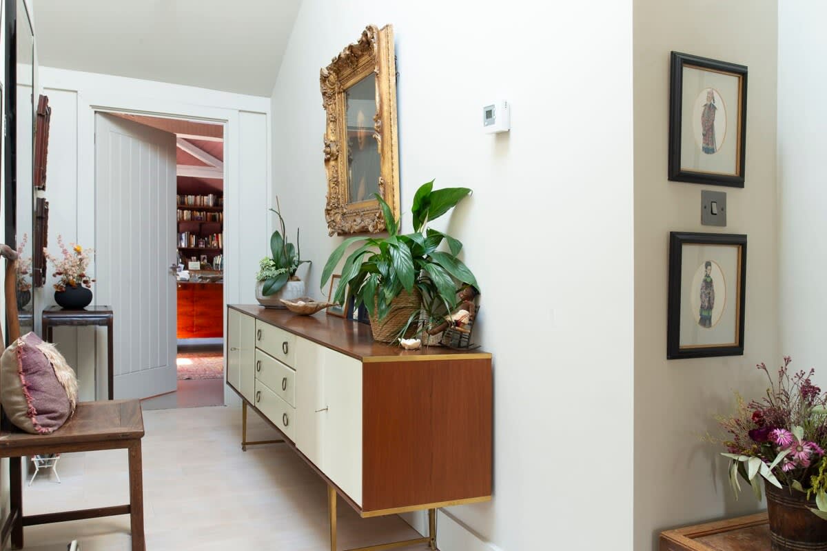 The home is tastefully furnished with interesting and individual pieces.