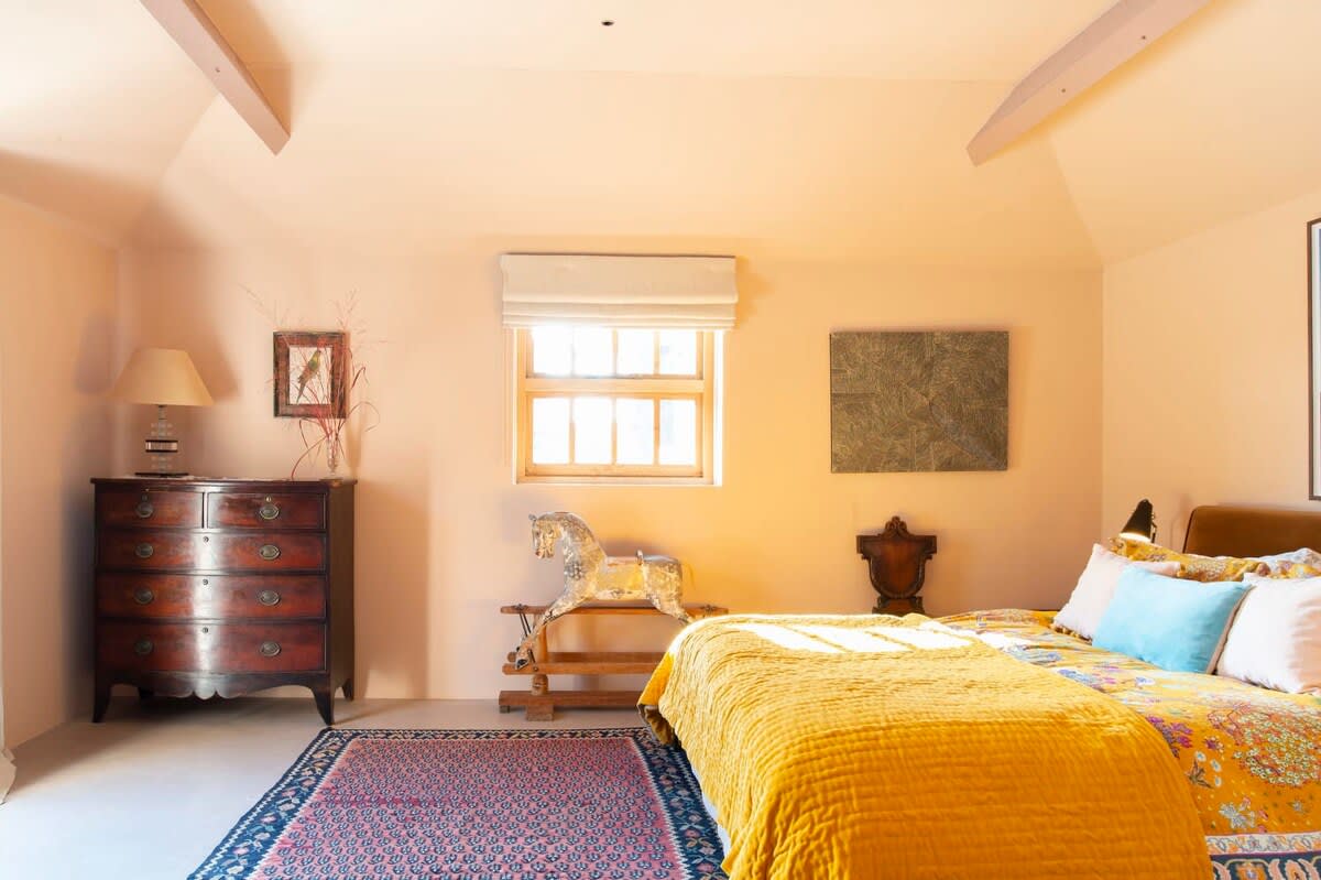 Each bedroom has space for guest belongings, as well as side tables and reading lamps.
