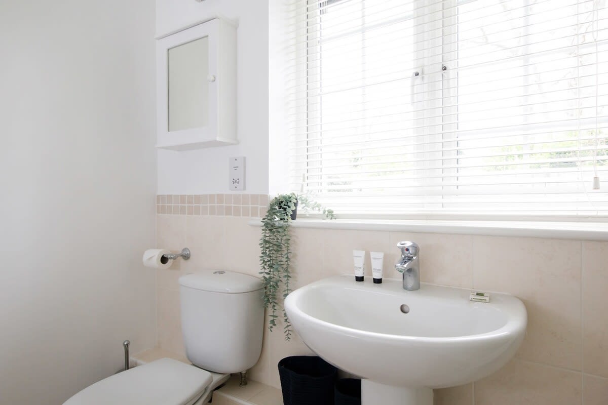 The en-suite shower room has a WC and basin.