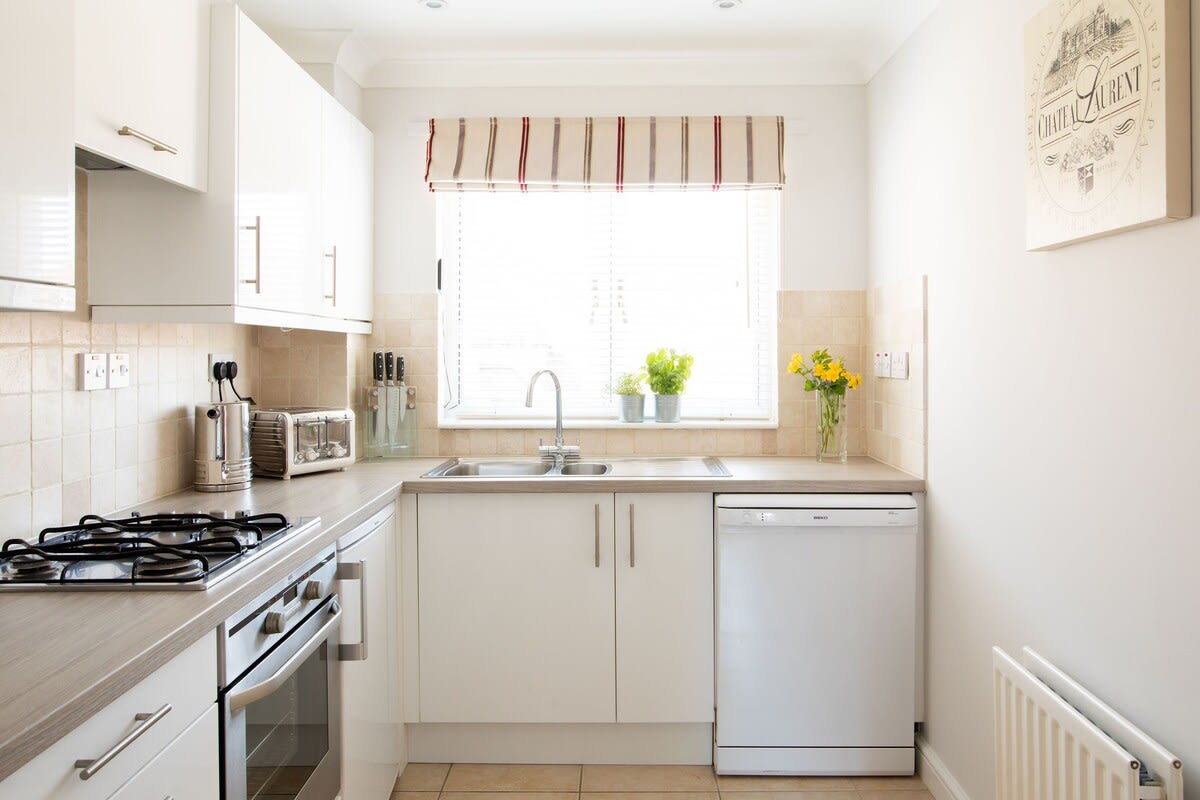A bright space to make your morning coffee (Nespresso machine with several pods provided).
