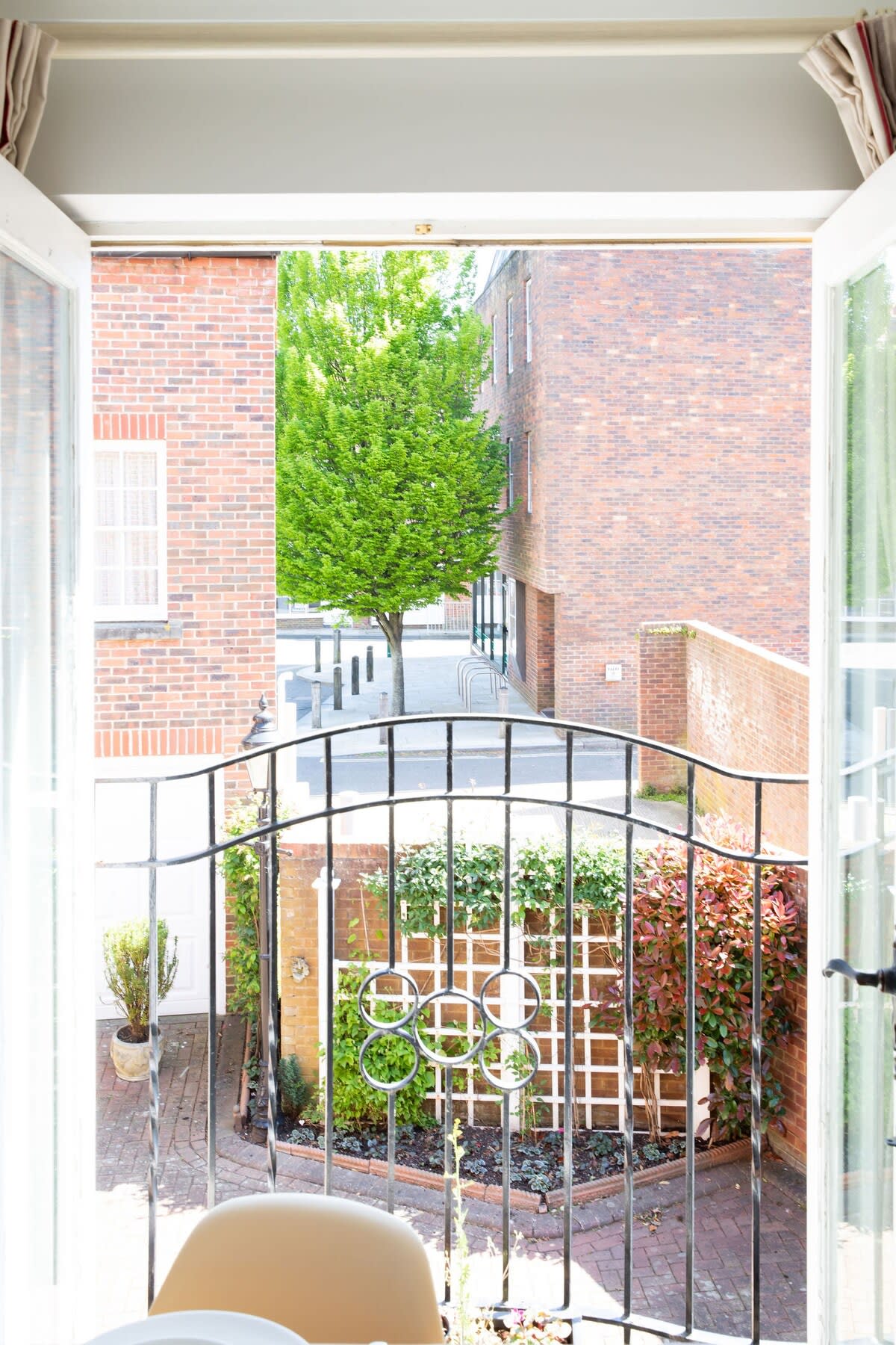 Let fresh air in during the warmer months by opening up the Juliet balcony.