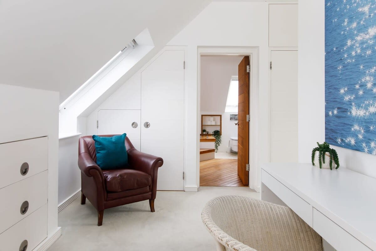 The master room has plenty of cupboard and draw space for your belongings.