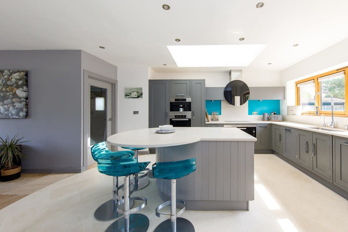 The spacious kitchen and dining area is the perfect place for family and friends to come together.