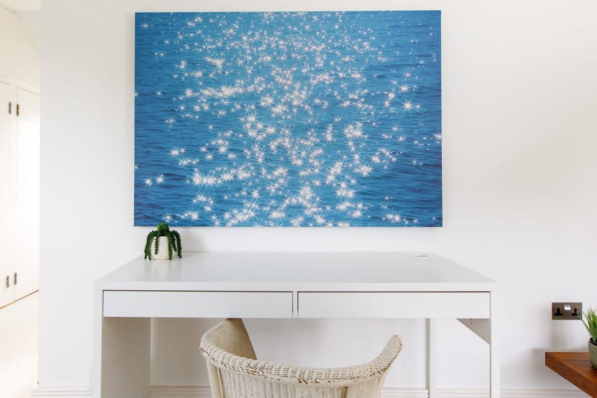 The master bedroom has a relaxing desk space if you need to catch up on emails or work.