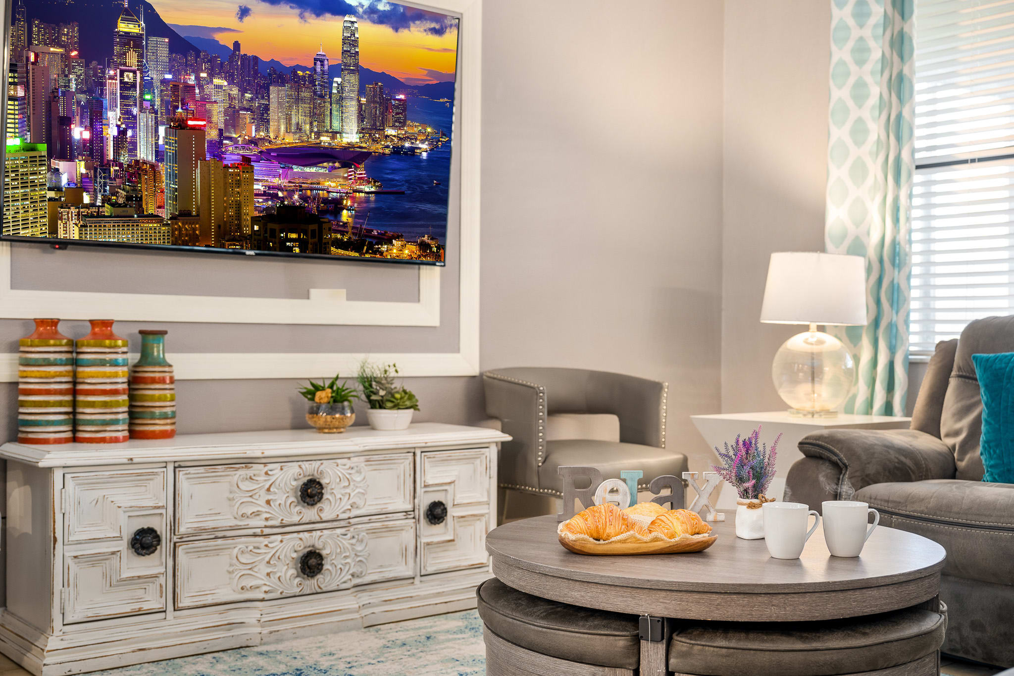 Dresser area w/ themed decor and a polished, finished look.