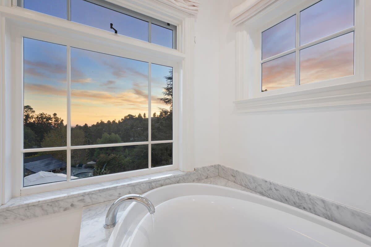 Watch the sunset as you soak in the luxurious tub