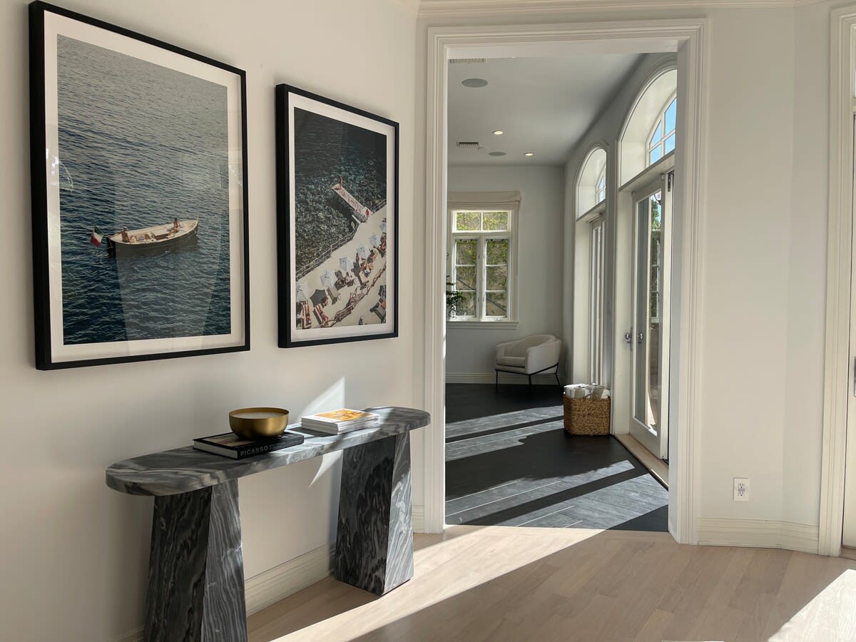 Natural light flows through the beautiful french arch windows