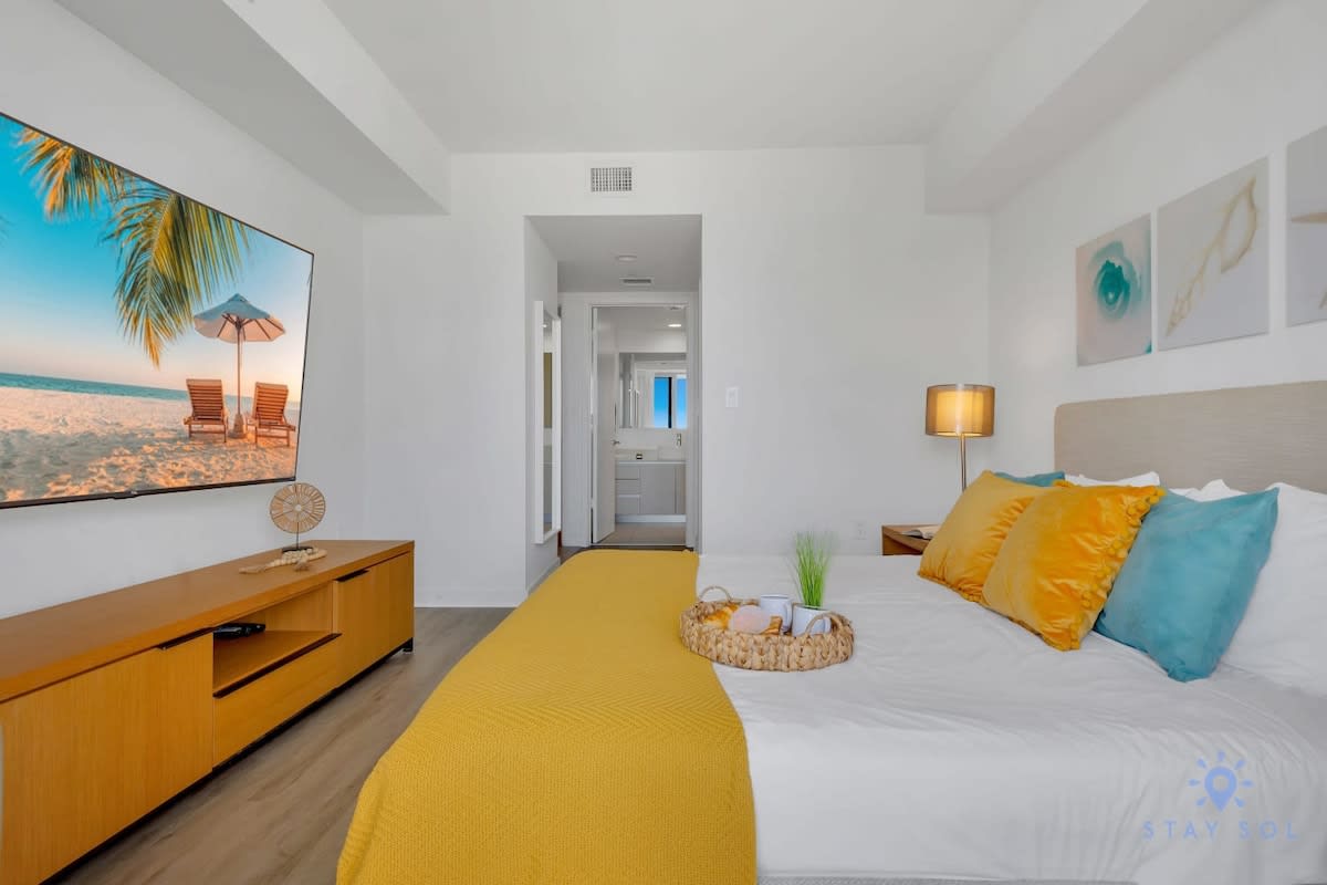 Relaxing Resort Stay, Balcony & Pool Steps