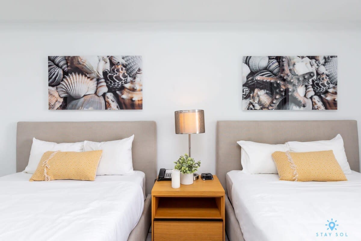 Steps from the Coast | Balcony Studio & Pool