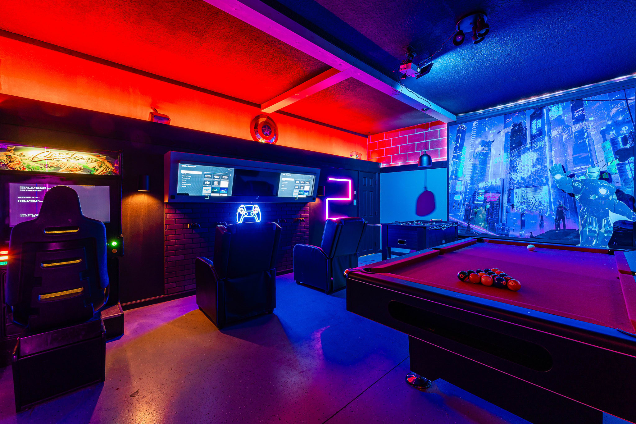 Neon-lit game room creating a fun, high-energy hangout space.