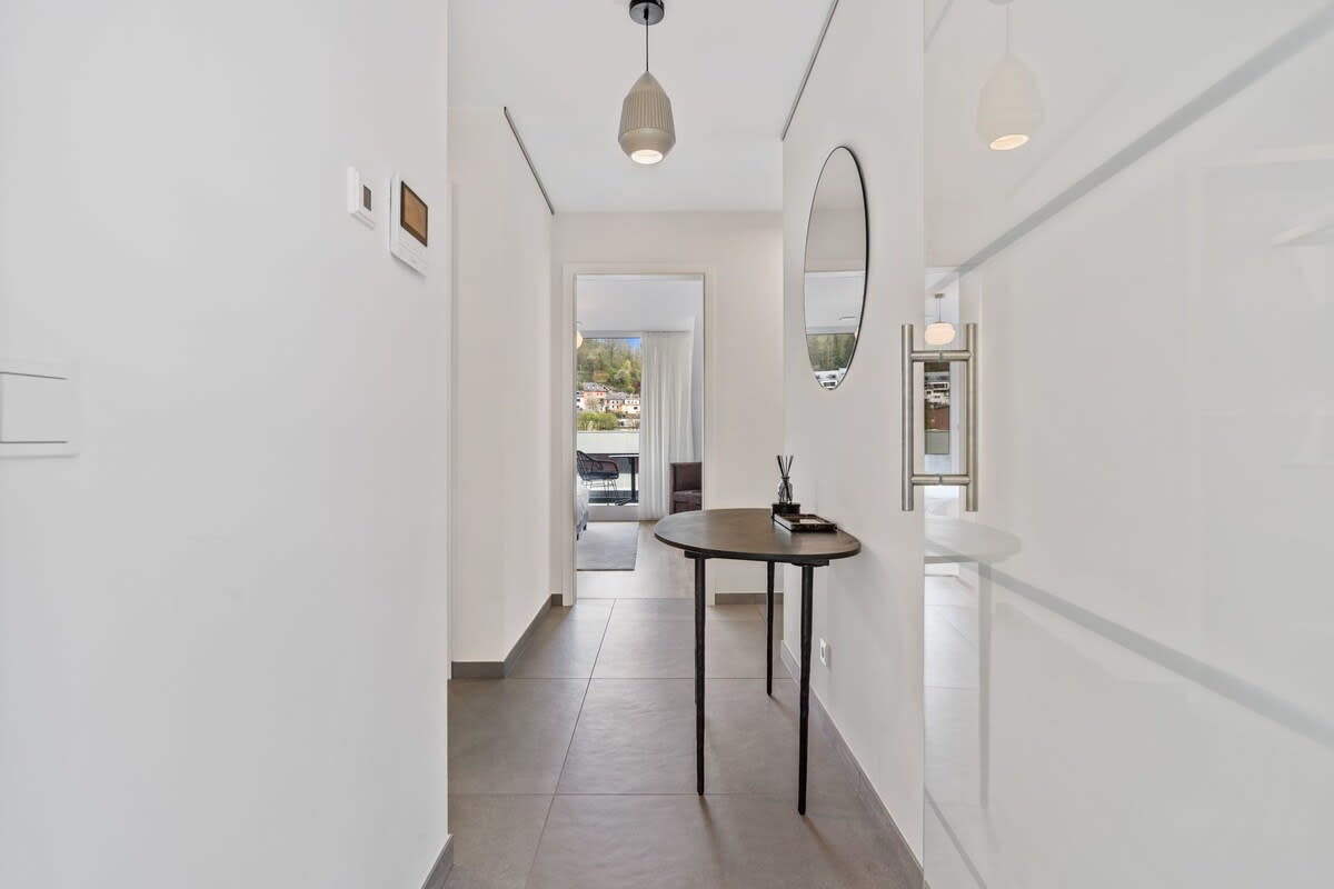A welcoming hallway that leads you into a world of comfort and style.