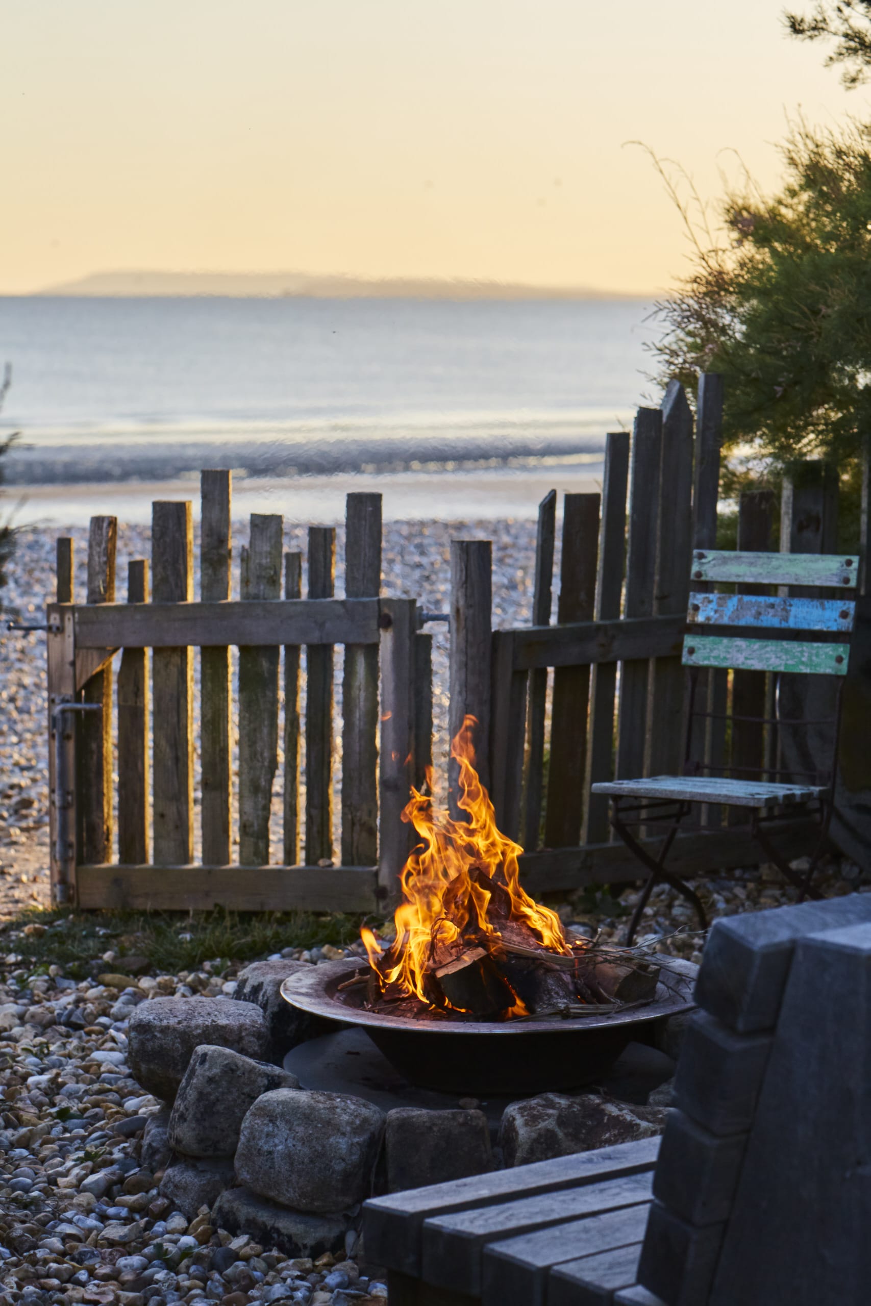 Light the fire pit as the sunsets, roast some marshmallows and chat long into the evening to lapping waves.