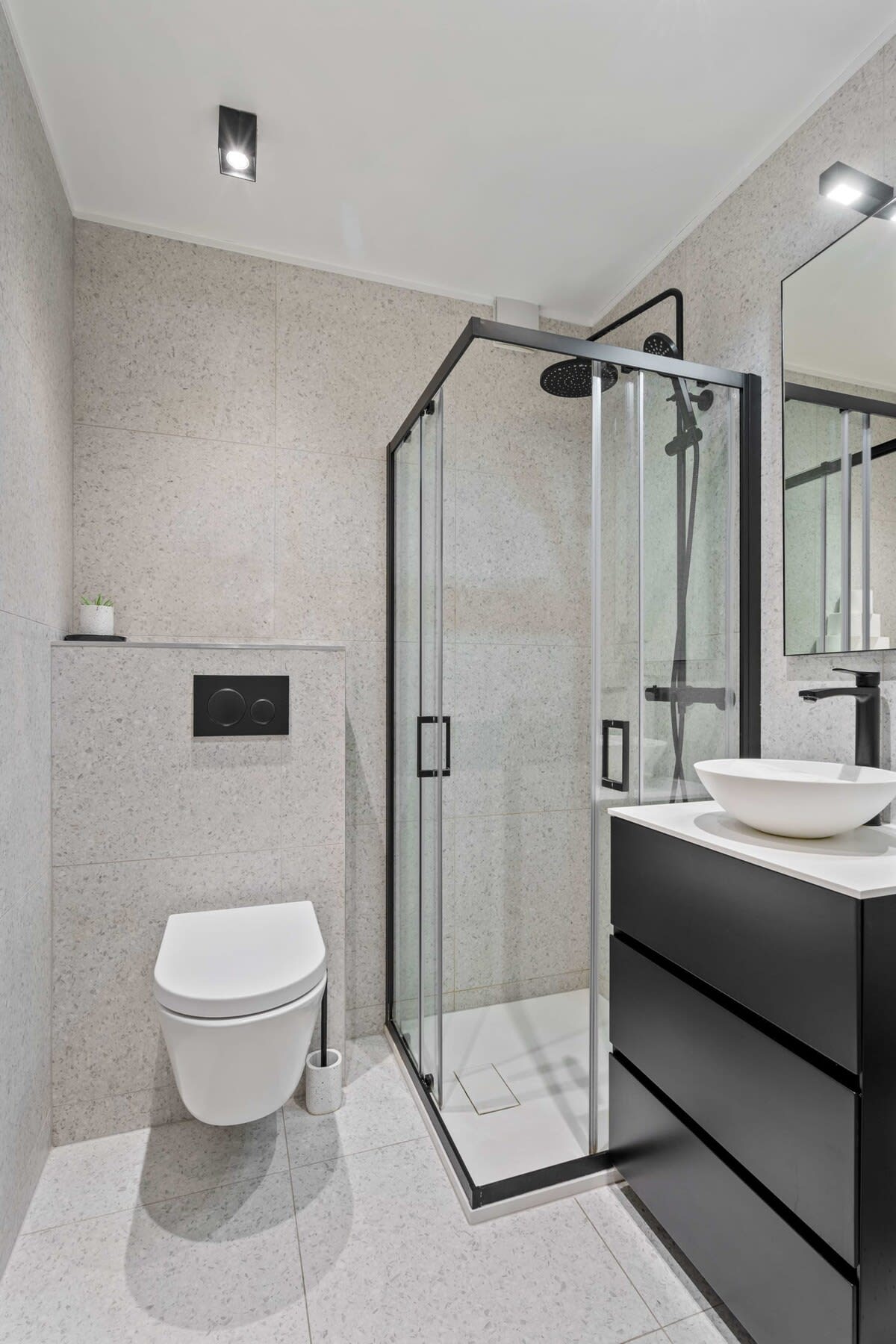 Contemporary bathroom with a spacious shower to unwind.
