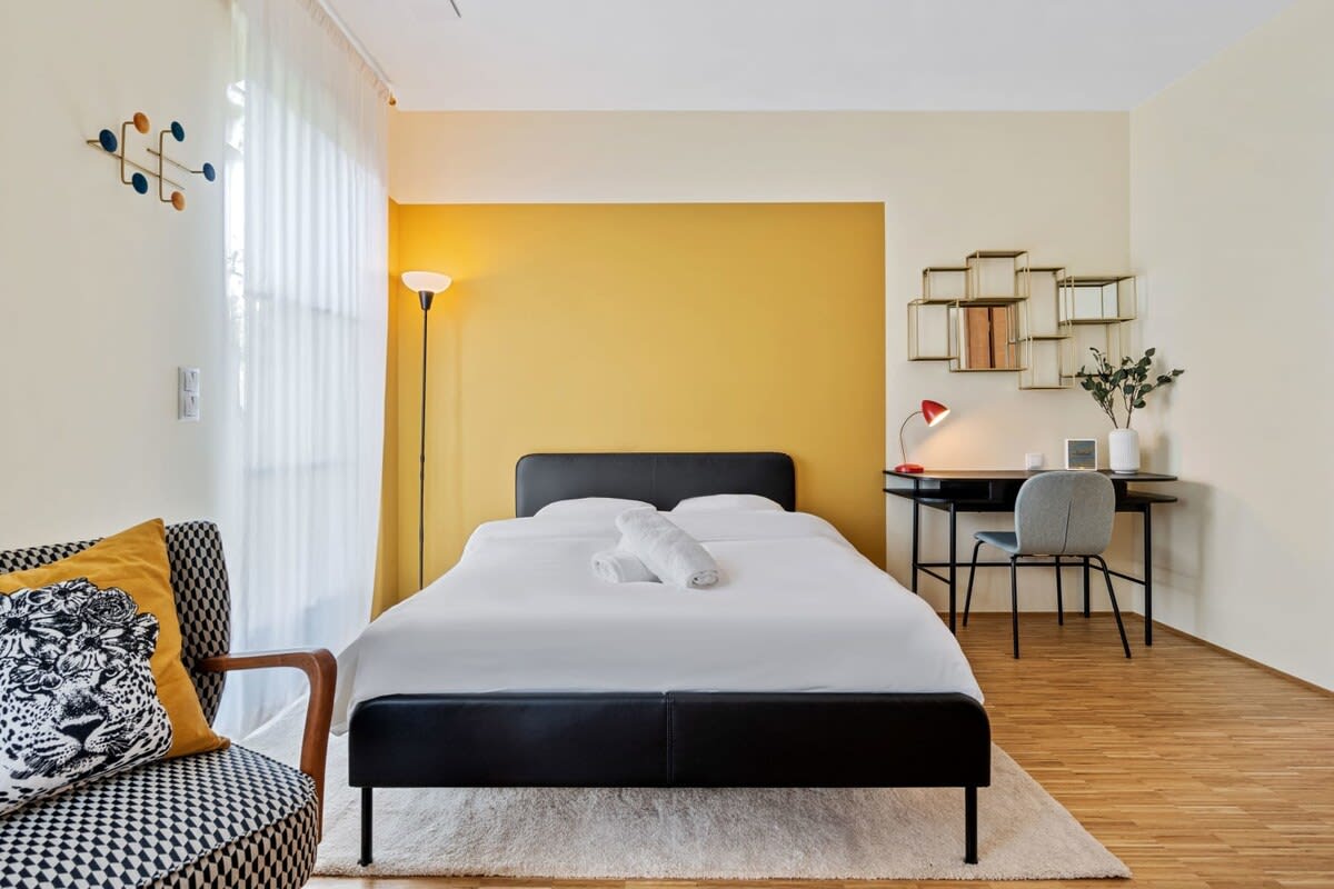 Dream easy in our minimalist bedroom with a touch of home.