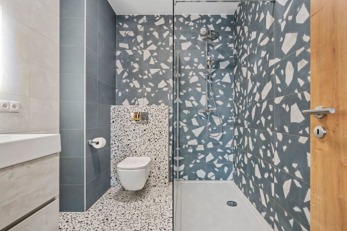 Indulge in the tranquility of our contemporary bathroom.