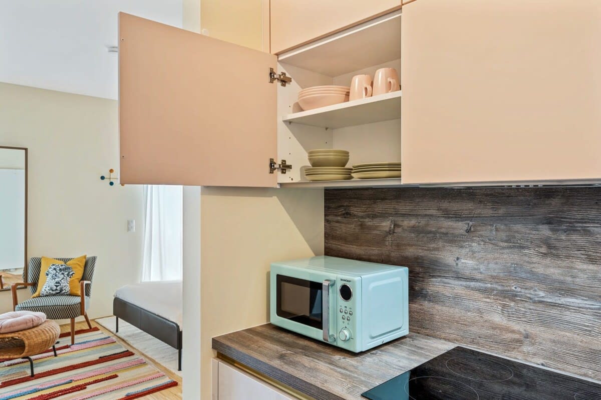 Whip up your favorite dishes in our compact, chic kitchen.