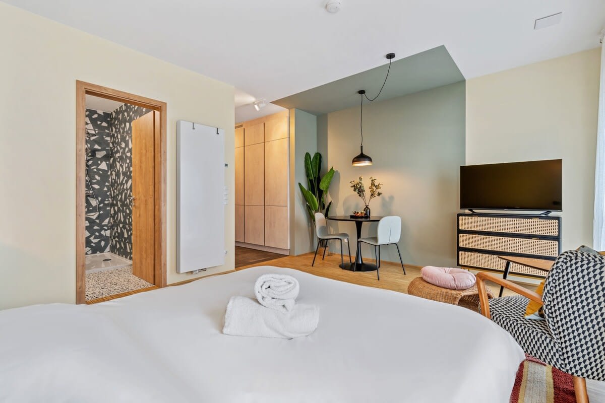 Bright, modern space combining sleep & dine in style.