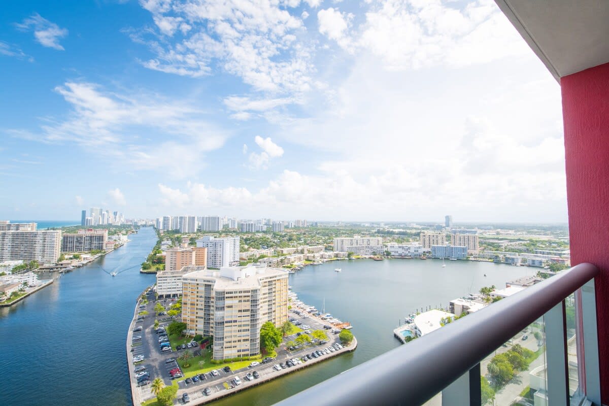 Infinite View| Balcony & Pool+ Gym+ Near Beach - Photo 1