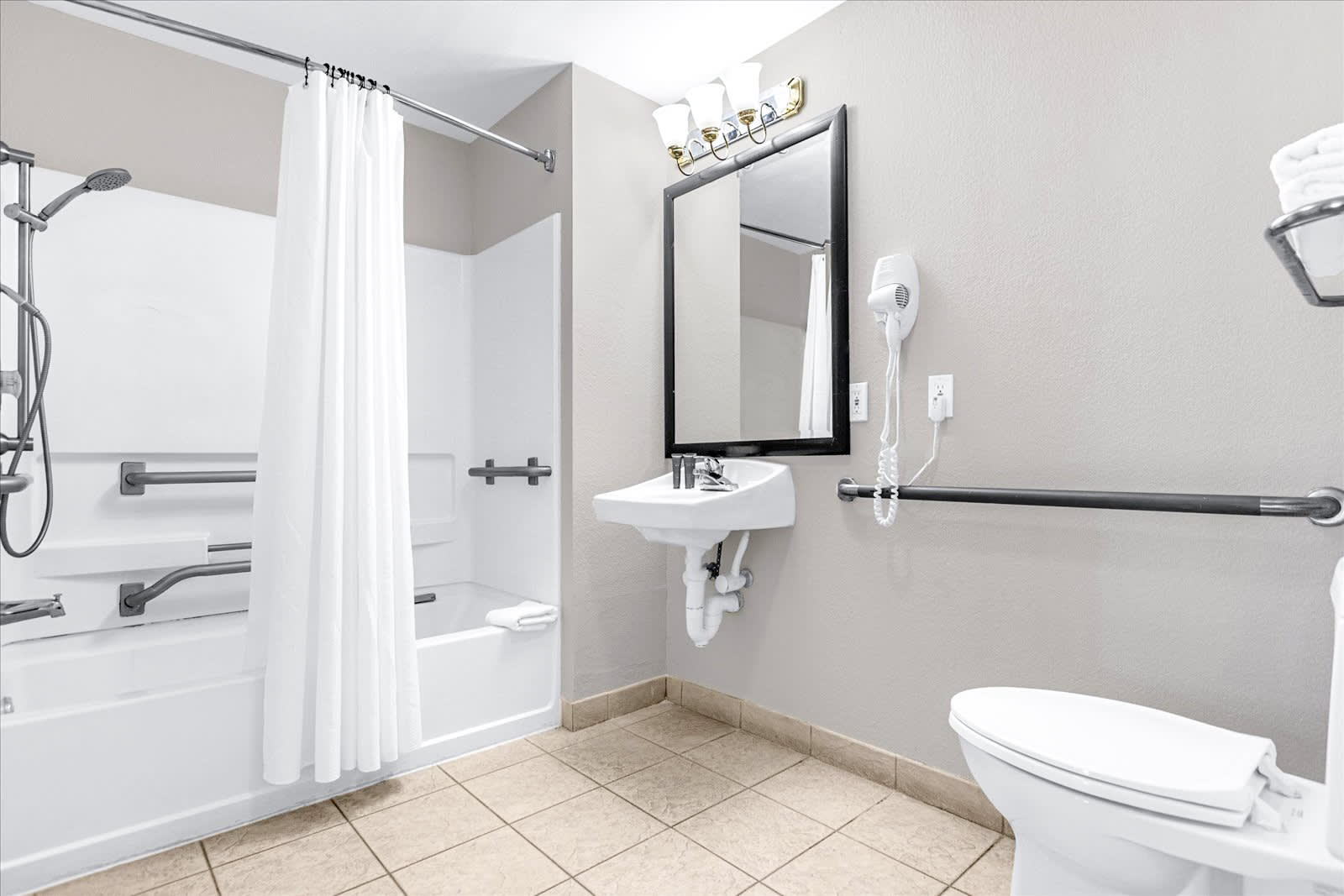 Fully Accessible Bathroom With Modern Amenities And Safety Features