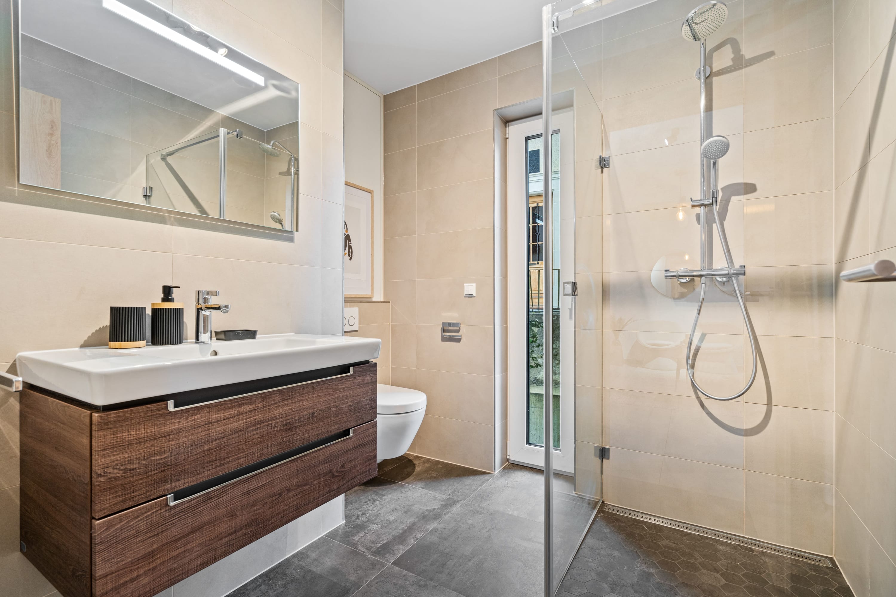 Experience a spa-like retreat in our contemporary bathroom with luxury finishes.