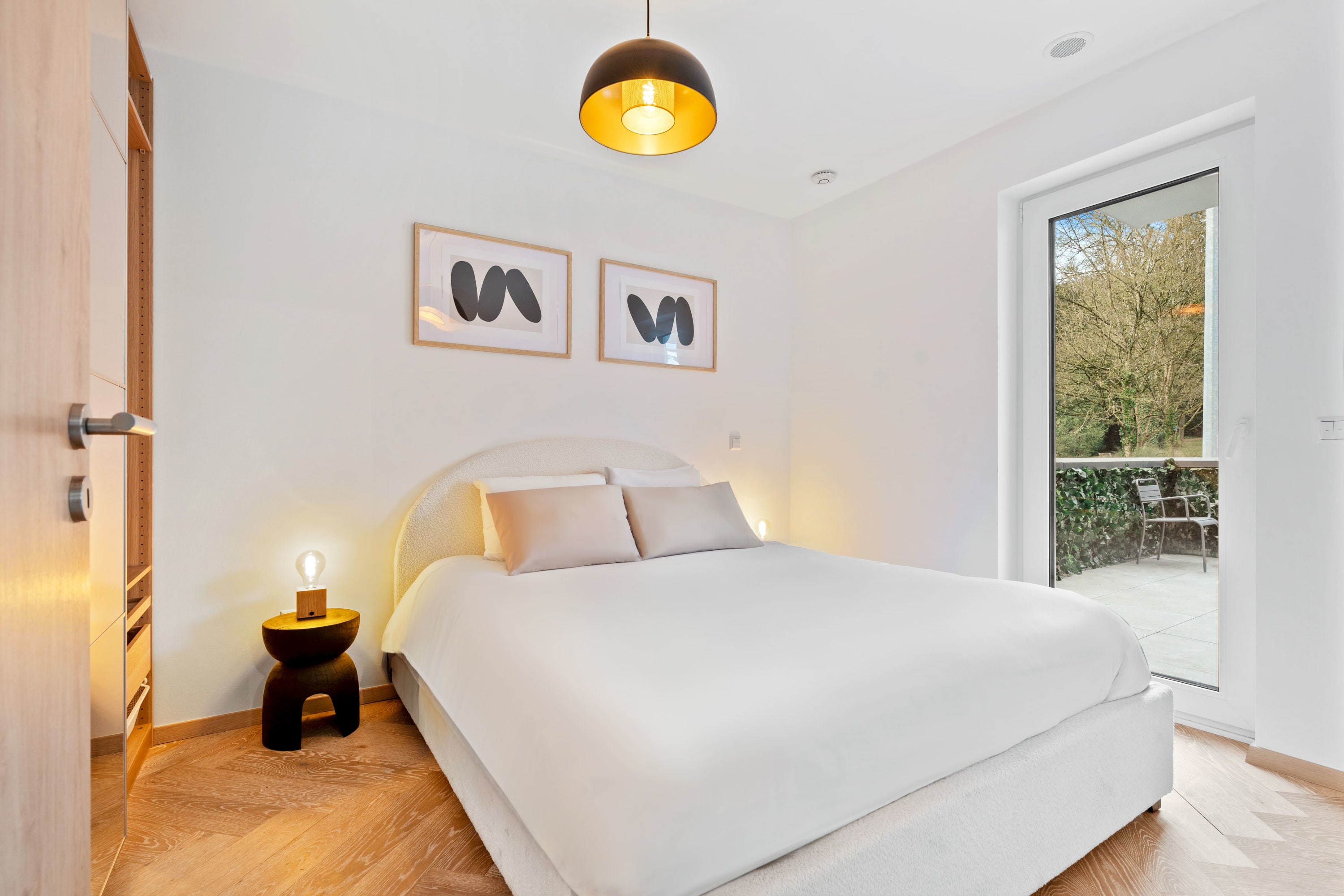 Dream peacefully in our minimalist bedroom with a view of the stars.