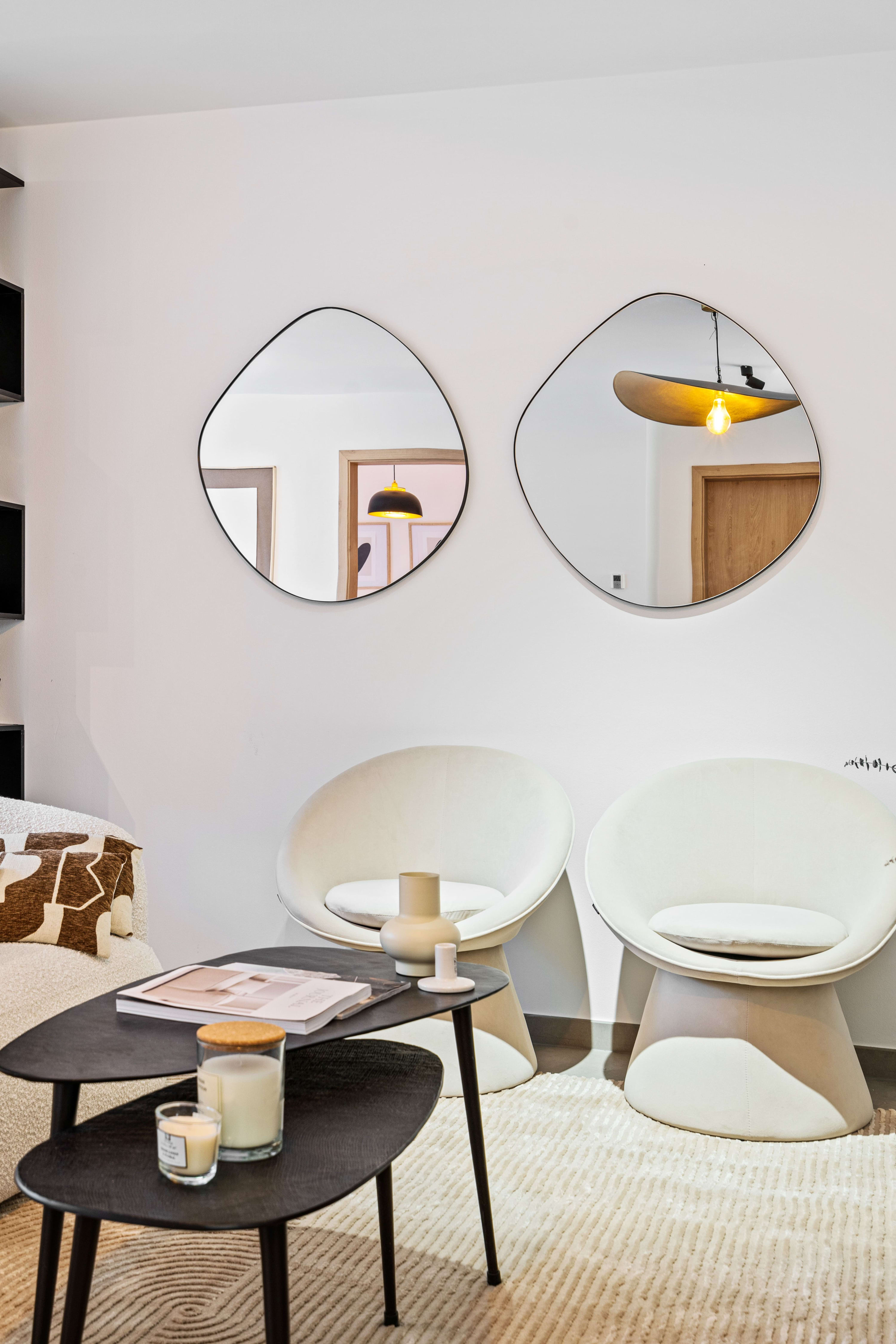 Modern meets comfort in this spacious lounge area, perfect for unwinding.