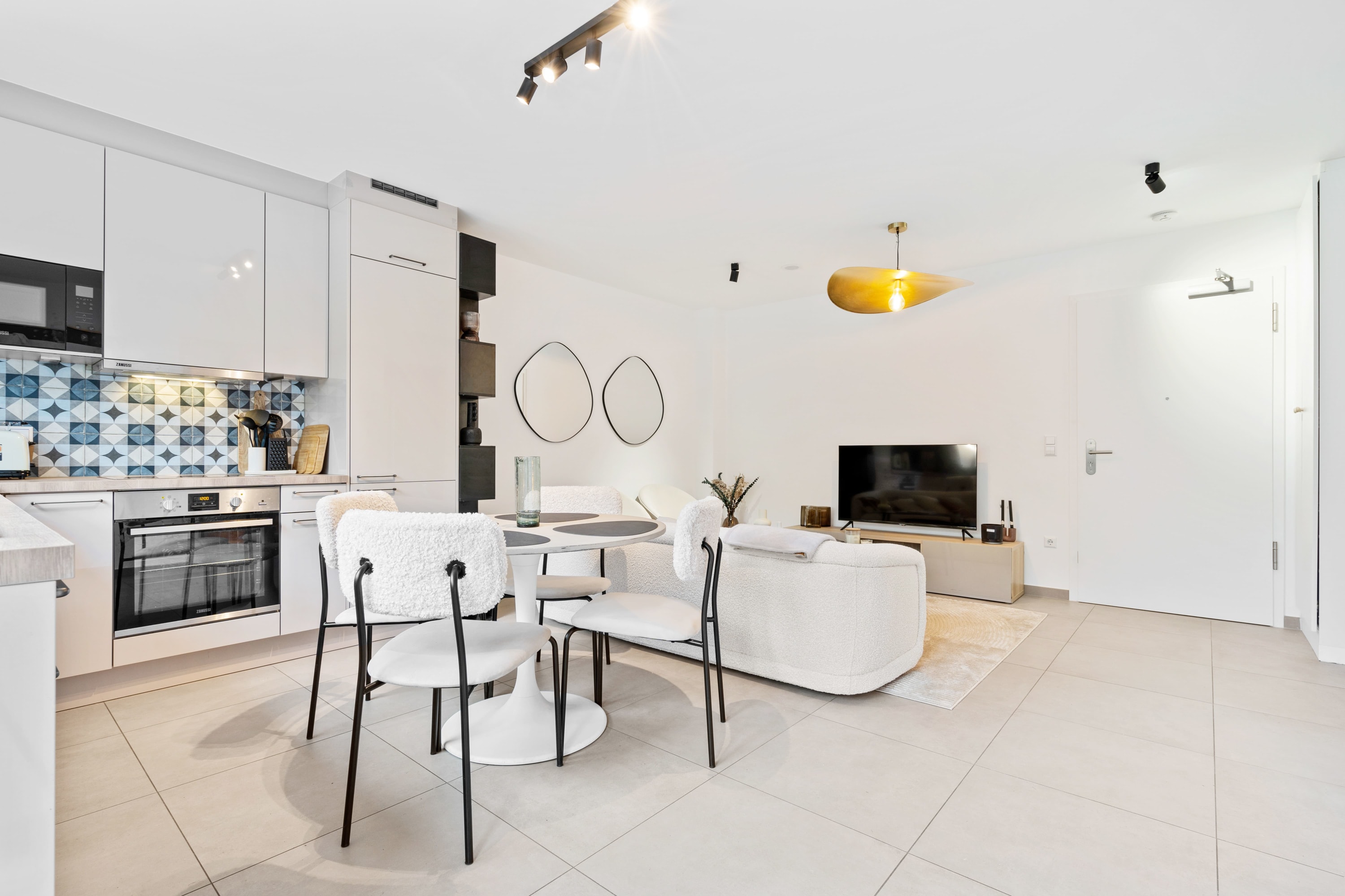 Sip your morning coffee bathed in sunlight in our inviting living room.